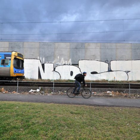 Nost Graffiti in train lane Melbourne