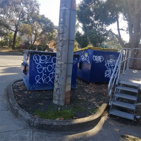 Remove graffiti from bin