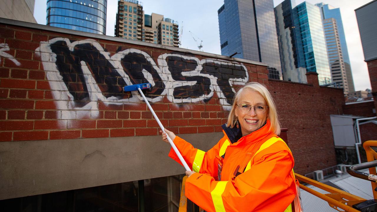 Melbourne Lord Mayor Sally Capp cleans up graffiti 